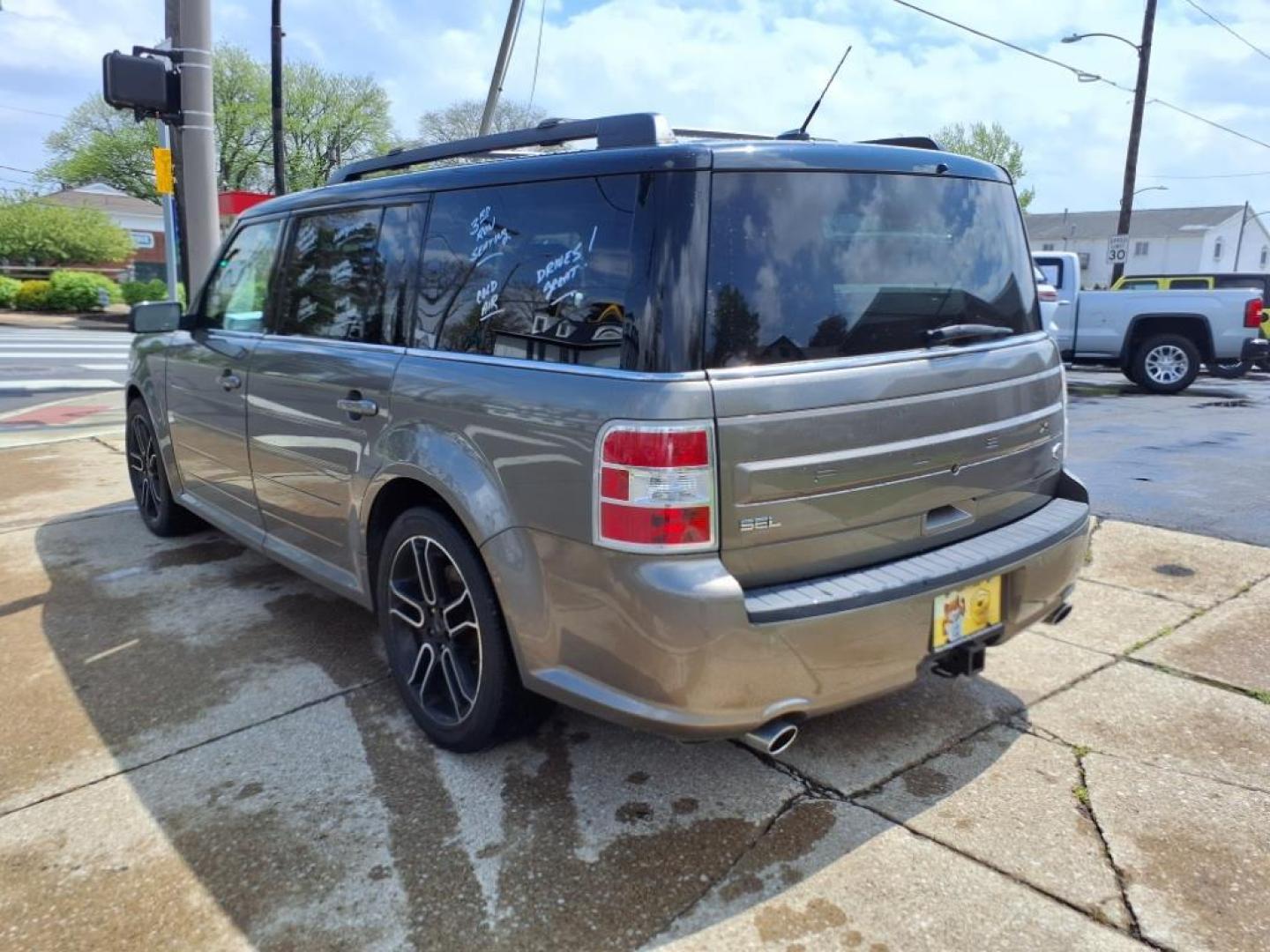 2014 Kodiak Brown Metallic J1 Ford Flex SEL (2FMGK5C86EB) with an 3.5L 3.5L V6 287hp 254ft. lbs. Sequential Multiport Fuel Injection engine, 6-Speed Shiftable Automatic transmission, located at 5505 N. Summit St., Toledo, OH, 43611, (419) 729-2688, 41.654953, -83.530014 - Photo#23
