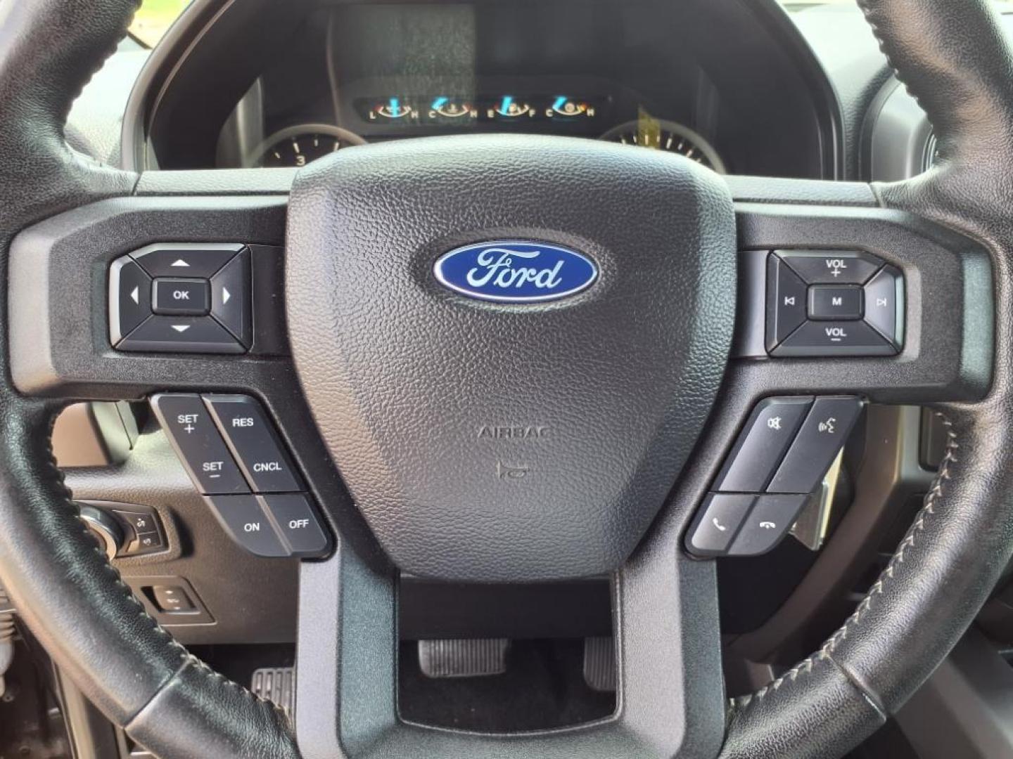 2019 Agate Black Um Ford F-150 XLT (1FTEW1EP3KF) with an 2.7L EcoBoost 2.7L Twin Turbo V6 325hp 400ft. lbs. Direct Injection engine, 10-Speed Shiftable Automatic transmission, located at 5505 N. Summit St., Toledo, OH, 43611, (419) 729-2688, 41.654953, -83.530014 - Photo#7