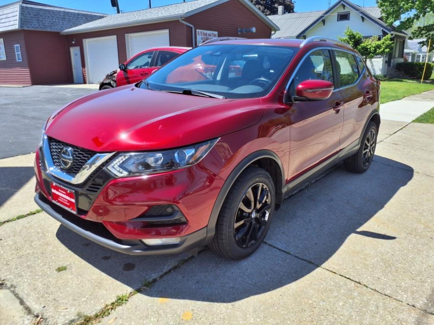2022 Scarlet Ember Tintcoat Nissan Rogue Sport SV (JN1BJ1BV9NW) with an 2.0L 2.0L I4 141hp 147ft. lbs. Direct Injection engine, 7-Speed Shiftable CVT transmission, located at 5505 N. Summit St., Toledo, OH, 43611, (419) 729-2688, 41.654953, -83.530014 - Photo#19