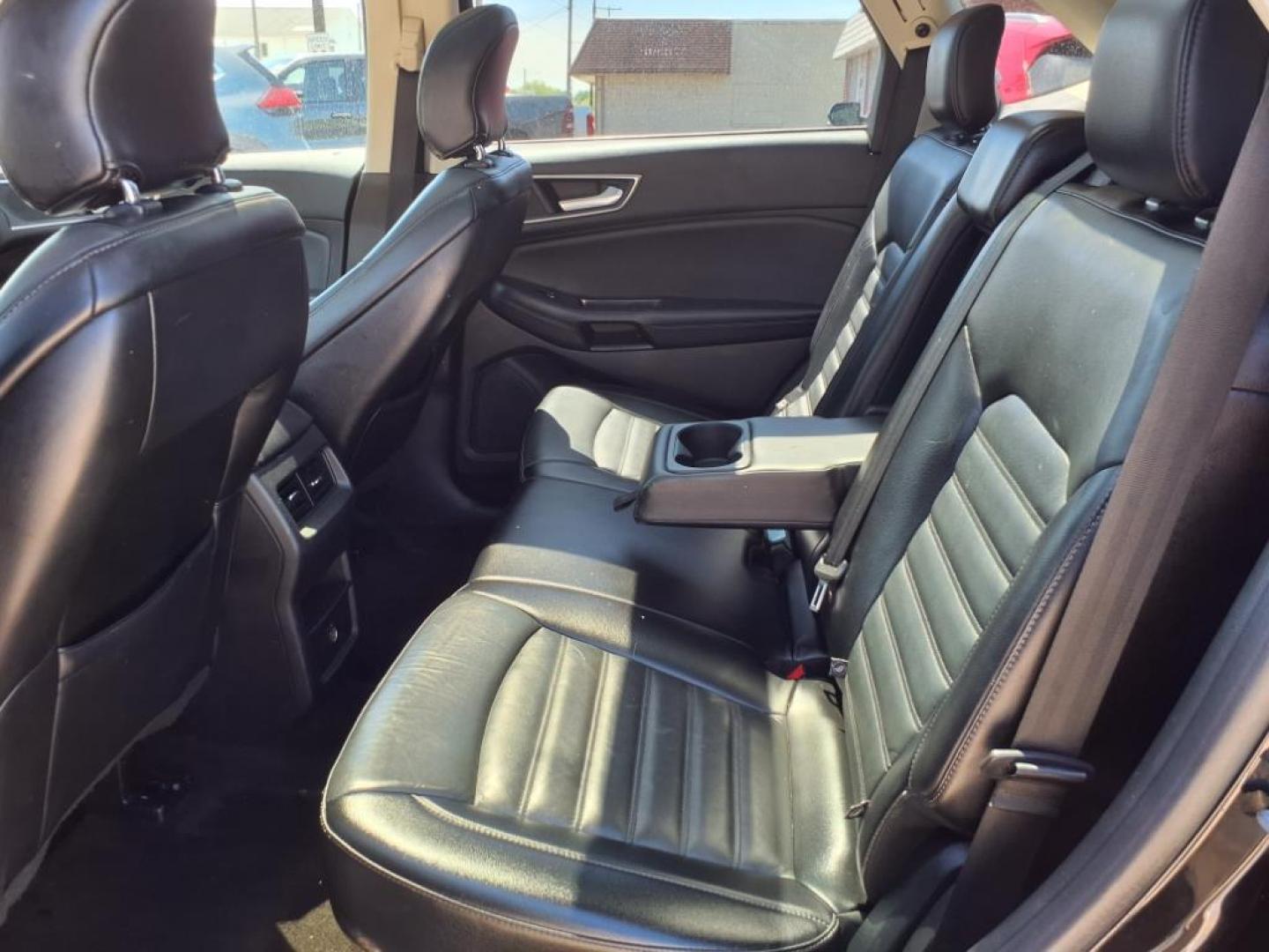 2017 Shadow Black Ford Edge AWD SEL (2FMPK4J87HB) with an 3.5L 3.5L V6 280hp 250ft. lbs. Sequential Multiport Fuel Injection engine, 6-Speed Shiftable Automatic transmission, located at 5505 N. Summit St., Toledo, OH, 43611, (419) 729-2688, 41.654953, -83.530014 - Photo#4