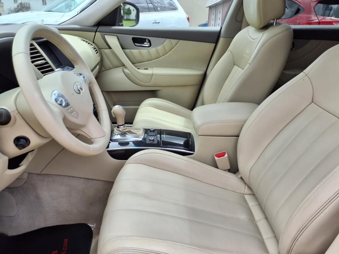 2013 Umbria Twilight INFINITI FX37 AWD Base (JN8CS1MW1DM) with an 3.7L 3.7L V6 325hp 267ft. lbs. Direct Injection engine, 7-Speed Shiftable Automatic transmission, located at 5505 N. Summit St., Toledo, OH, 43611, (419) 729-2688, 41.654953, -83.530014 - Photo#2