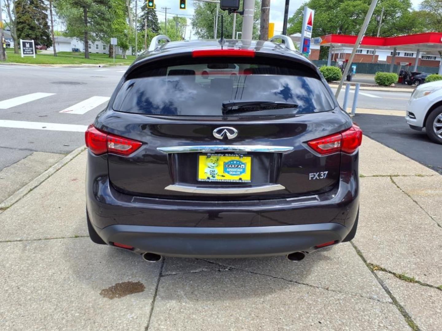 2013 Umbria Twilight INFINITI FX37 AWD Base (JN8CS1MW1DM) with an 3.7L 3.7L V6 325hp 267ft. lbs. Direct Injection engine, 7-Speed Shiftable Automatic transmission, located at 5505 N. Summit St., Toledo, OH, 43611, (419) 729-2688, 41.654953, -83.530014 - Photo#27