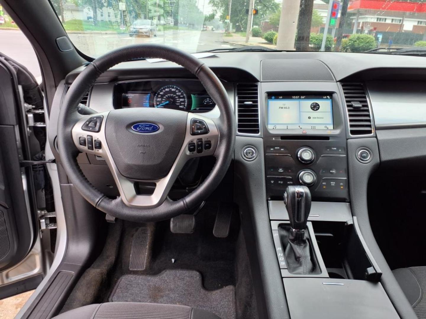2017 Ingot Silver Ford Taurus AWD SEL (1FAHP2H88HG) with an 3.5L 3.5L V6 288hp 254ft. lbs. Sequential Multiport Fuel Injection engine, 6-Speed Shiftable Automatic transmission, located at 5505 N. Summit St., Toledo, OH, 43611, (419) 729-2688, 41.654953, -83.530014 - Photo#4