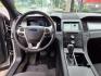 2017 Ingot Silver Ford Taurus AWD SEL (1FAHP2H88HG) with an 3.5L 3.5L V6 288hp 254ft. lbs. Sequential Multiport Fuel Injection engine, 6-Speed Shiftable Automatic transmission, located at 5505 N. Summit St., Toledo, OH, 43611, (419) 729-2688, 41.654953, -83.530014 - Photo#4