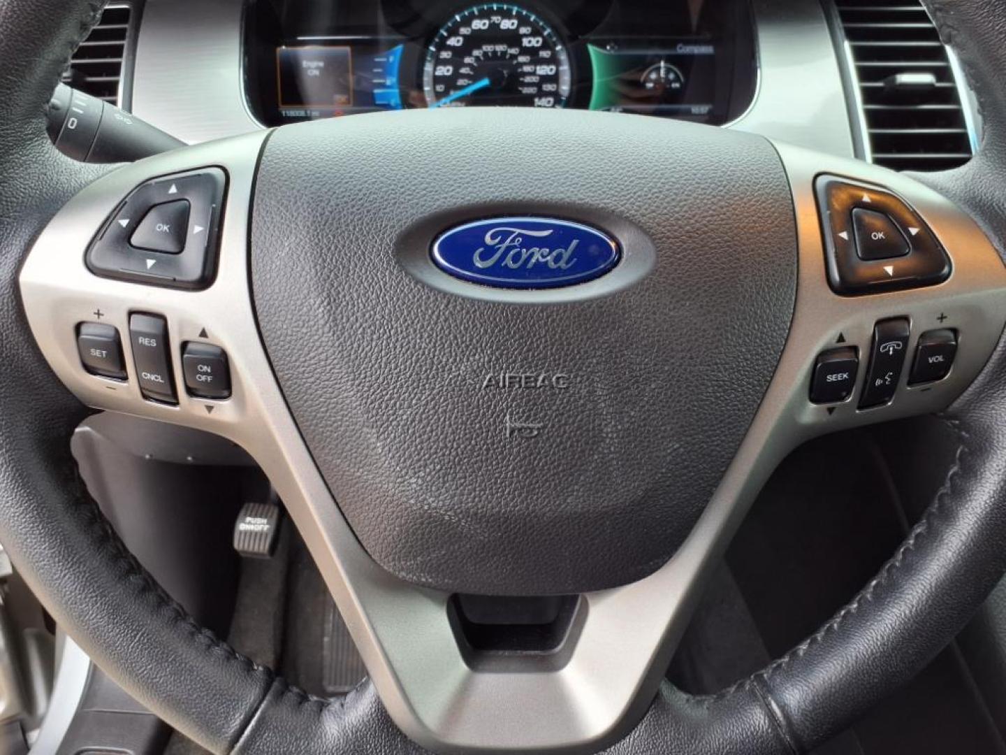 2017 Ingot Silver Ford Taurus AWD SEL (1FAHP2H88HG) with an 3.5L 3.5L V6 288hp 254ft. lbs. Sequential Multiport Fuel Injection engine, 6-Speed Shiftable Automatic transmission, located at 5505 N. Summit St., Toledo, OH, 43611, (419) 729-2688, 41.654953, -83.530014 - Photo#7