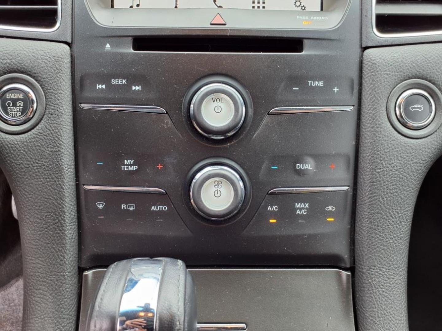 2017 Ingot Silver Ford Taurus AWD SEL (1FAHP2H88HG) with an 3.5L 3.5L V6 288hp 254ft. lbs. Sequential Multiport Fuel Injection engine, 6-Speed Shiftable Automatic transmission, located at 5505 N. Summit St., Toledo, OH, 43611, (419) 729-2688, 41.654953, -83.530014 - Photo#12