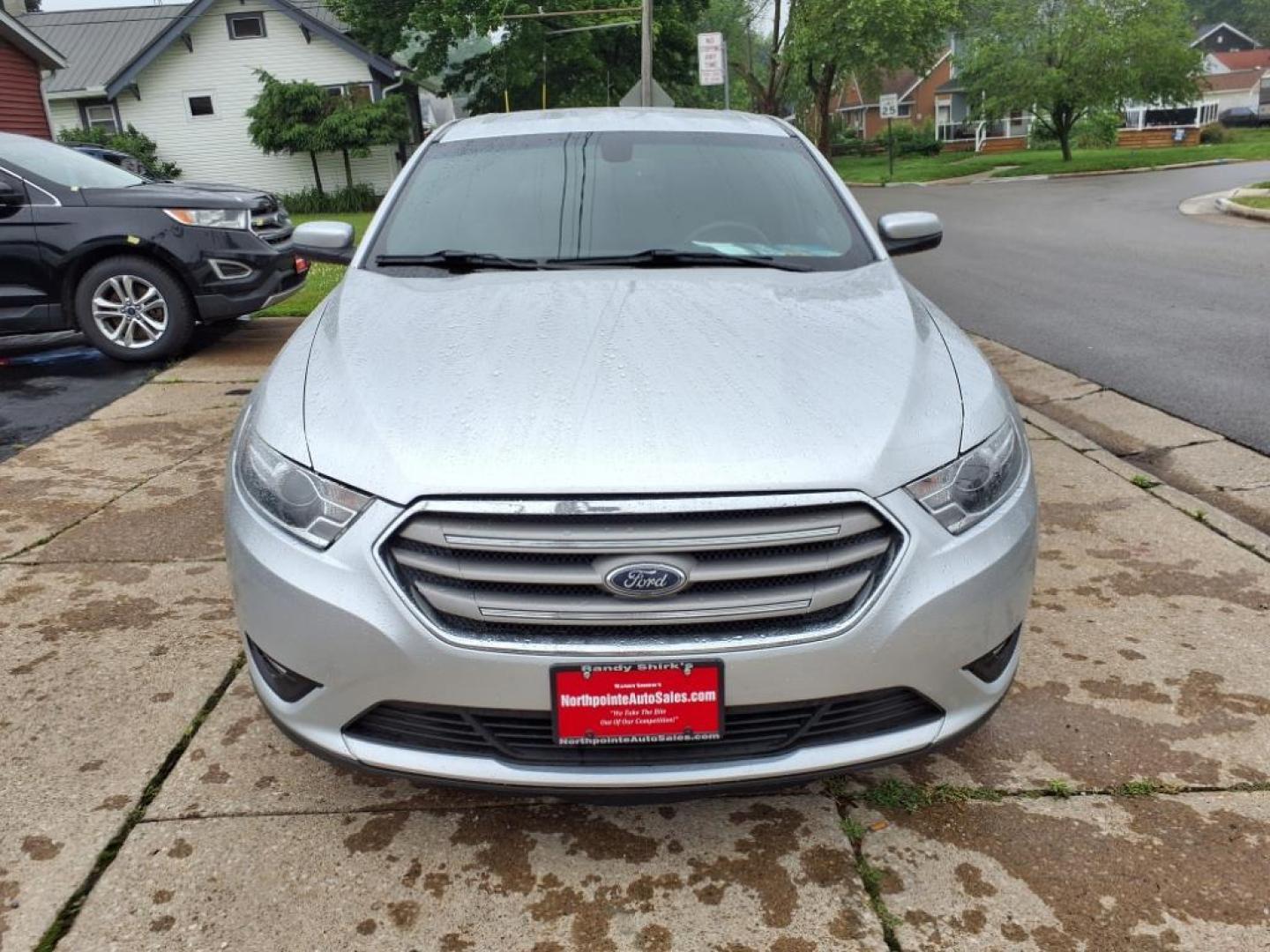2017 Ingot Silver Ford Taurus AWD SEL (1FAHP2H88HG) with an 3.5L 3.5L V6 288hp 254ft. lbs. Sequential Multiport Fuel Injection engine, 6-Speed Shiftable Automatic transmission, located at 5505 N. Summit St., Toledo, OH, 43611, (419) 729-2688, 41.654953, -83.530014 - Photo#18