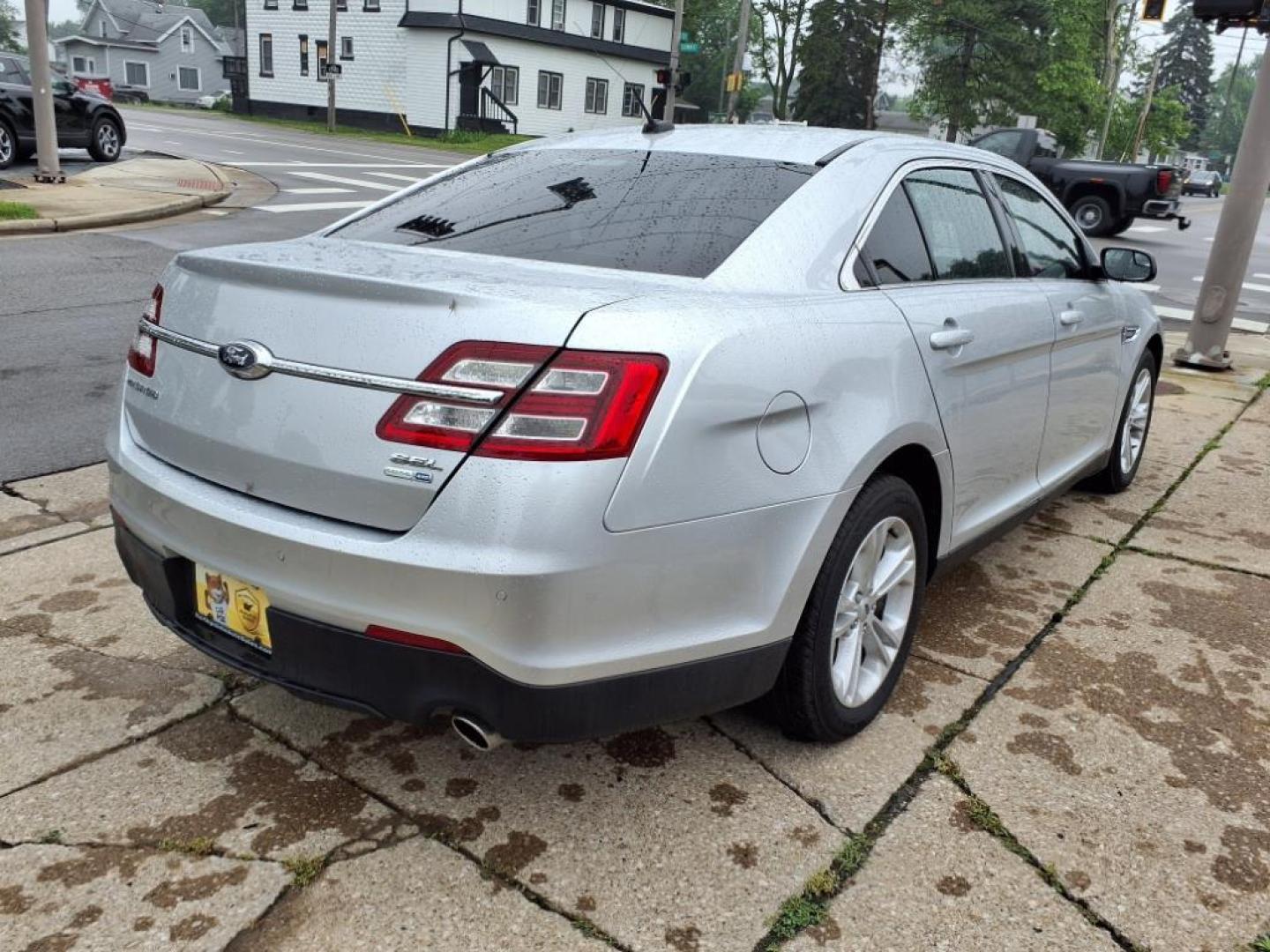 2017 Ingot Silver Ford Taurus AWD SEL (1FAHP2H88HG) with an 3.5L 3.5L V6 288hp 254ft. lbs. Sequential Multiport Fuel Injection engine, 6-Speed Shiftable Automatic transmission, located at 5505 N. Summit St., Toledo, OH, 43611, (419) 729-2688, 41.654953, -83.530014 - Photo#21