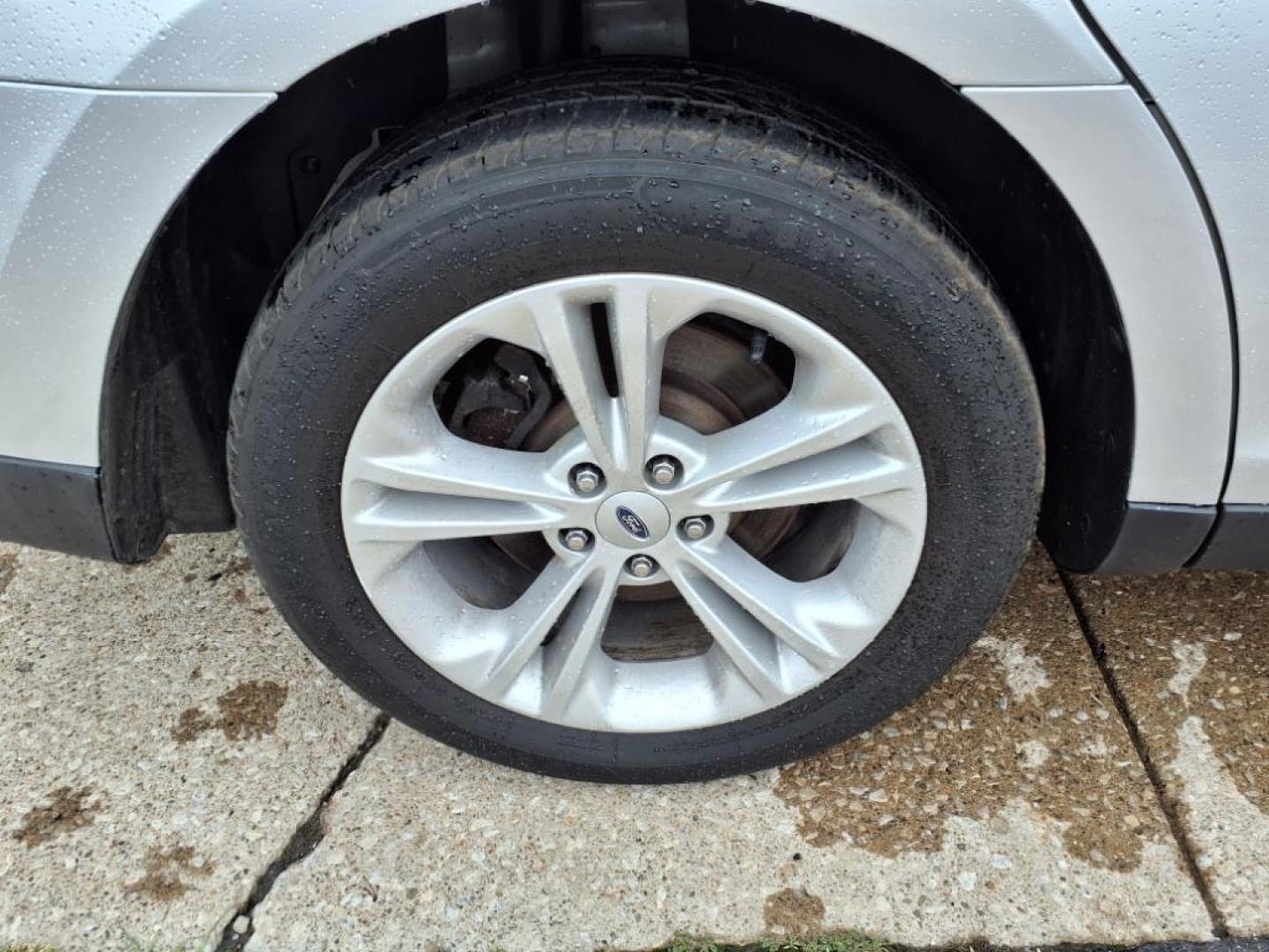 2017 Ingot Silver Ford Taurus AWD SEL (1FAHP2H88HG) with an 3.5L 3.5L V6 288hp 254ft. lbs. Sequential Multiport Fuel Injection engine, 6-Speed Shiftable Automatic transmission, located at 5505 N. Summit St., Toledo, OH, 43611, (419) 729-2688, 41.654953, -83.530014 - Photo#22