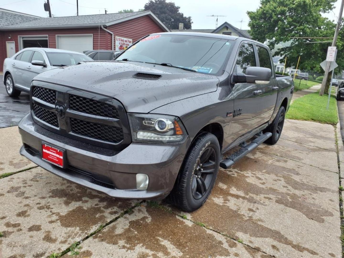 2018 Maximum Steel Metallic Clear Coat RAM 1500 4x4 Sport (1C6RR7MT8JS) with an 5.7L HEMI 5.7L V8 395hp 410ft. lbs. Sequential Multiport Fuel Injection engine, 8-Speed Shiftable Automatic transmission, located at 5505 N. Summit St., Toledo, OH, 43611, (419) 729-2688, 41.654953, -83.530014 - Photo#20