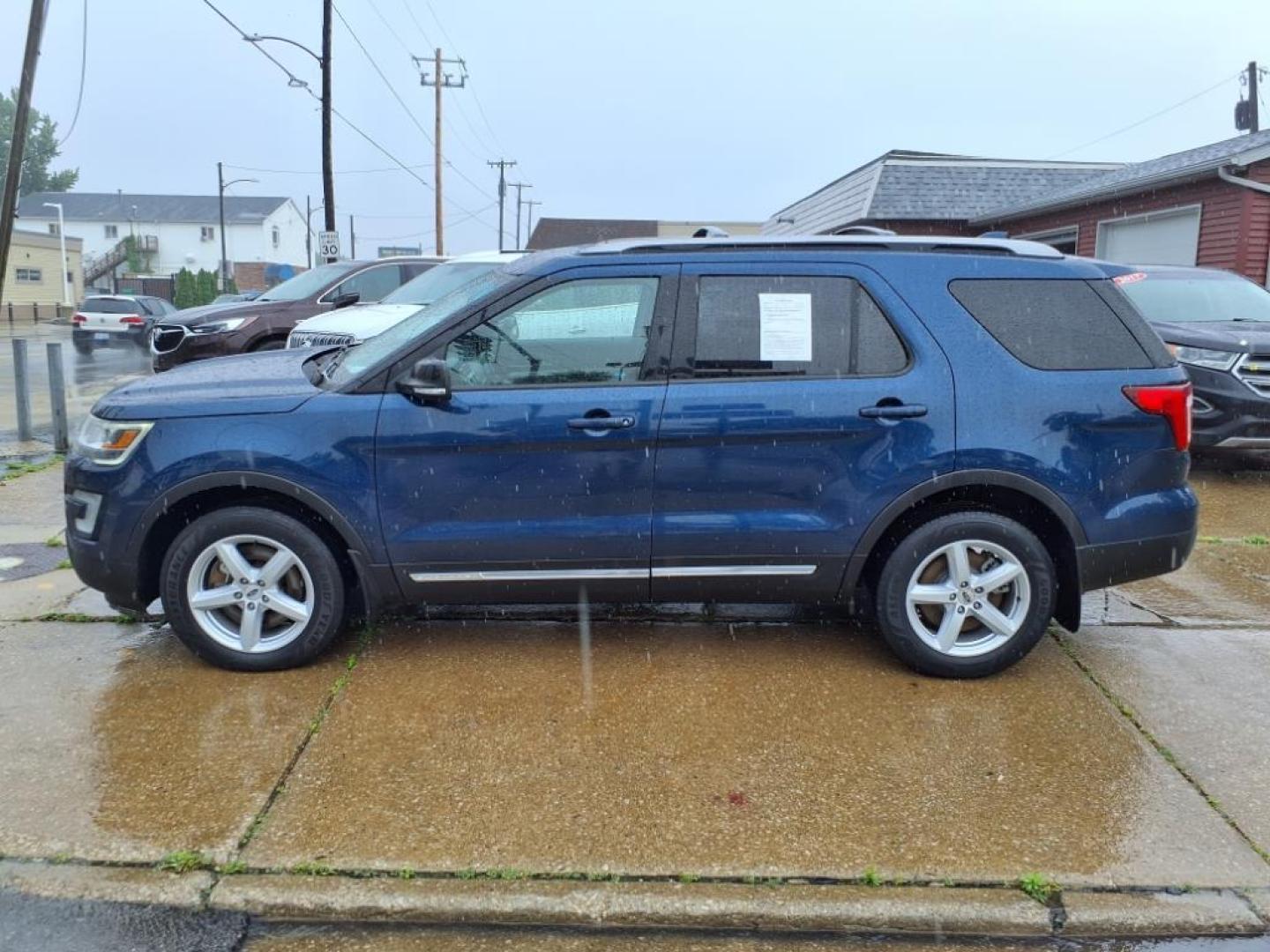 2016 Blue Jeans Ford Explorer AWD XLT (1FM5K8DH7GG) with an 2.3L EcoBoost 2.3L Turbo I4 280hp 310ft. lbs. Direct Injection engine, 6-Speed Shiftable Automatic transmission, located at 5505 N. Summit St., Toledo, OH, 43611, (419) 729-2688, 41.654953, -83.530014 - Photo#22