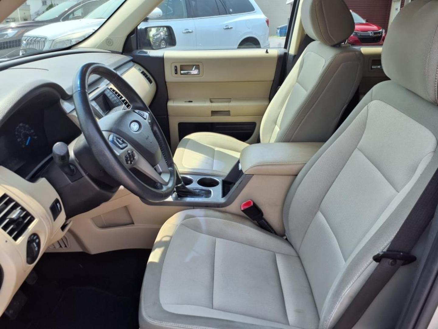 2013 Ingot Silver Metallic Ford Flex SE (2FMGK5B82DB) with an 3.5L 3.5L V6 287hp 254ft. lbs. Sequential Multiport Fuel Injection engine, 6-Speed Shiftable Automatic transmission, located at 5505 N. Summit St., Toledo, OH, 43611, (419) 729-2688, 41.654953, -83.530014 - Photo#1