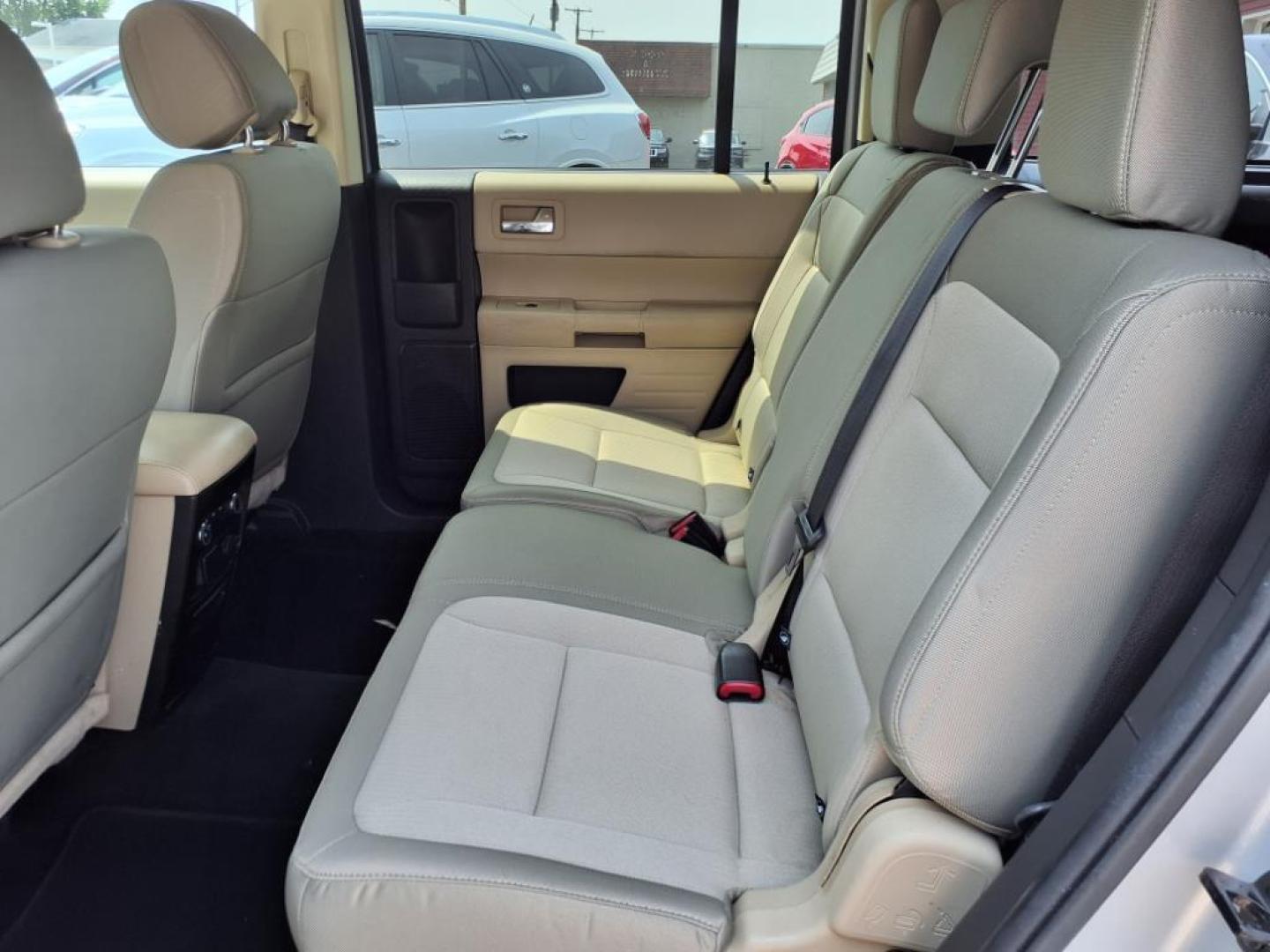 2013 Ingot Silver Metallic Ford Flex SE (2FMGK5B82DB) with an 3.5L 3.5L V6 287hp 254ft. lbs. Sequential Multiport Fuel Injection engine, 6-Speed Shiftable Automatic transmission, located at 5505 N. Summit St., Toledo, OH, 43611, (419) 729-2688, 41.654953, -83.530014 - Photo#3