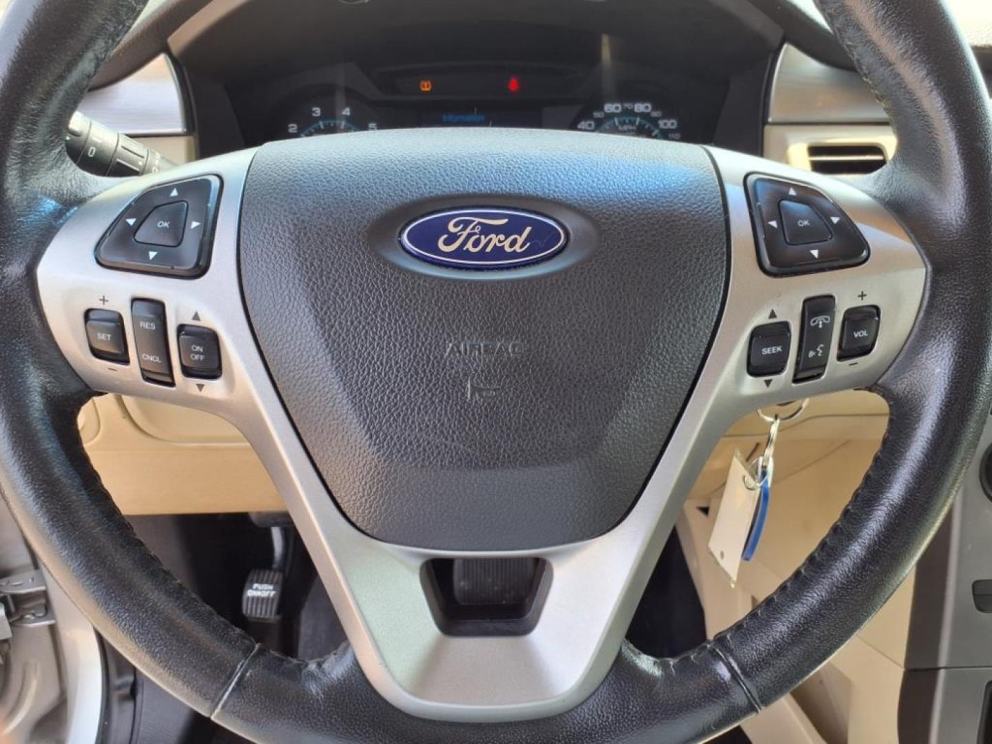2013 Ingot Silver Metallic Ford Flex SE (2FMGK5B82DB) with an 3.5L 3.5L V6 287hp 254ft. lbs. Sequential Multiport Fuel Injection engine, 6-Speed Shiftable Automatic transmission, located at 5505 N. Summit St., Toledo, OH, 43611, (419) 729-2688, 41.654953, -83.530014 - Photo#9