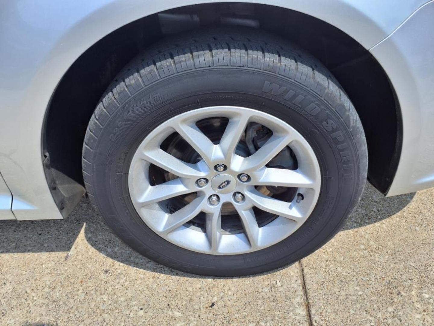 2013 Ingot Silver Metallic Ford Flex SE (2FMGK5B82DB) with an 3.5L 3.5L V6 287hp 254ft. lbs. Sequential Multiport Fuel Injection engine, 6-Speed Shiftable Automatic transmission, located at 5505 N. Summit St., Toledo, OH, 43611, (419) 729-2688, 41.654953, -83.530014 - Photo#23