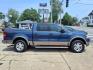 2004 Medium Wedgewood Blue Clearcoat Ford F-150 Lariat (1FTPW14574K) with an 5.4L Triton 5.4L V8 300hp 365ft. lbs. Sequential Multiport Fuel Injection engine, 4-Speed Automatic transmission, located at 5505 N. Summit St., Toledo, OH, 43611, (419) 729-2688, 41.654953, -83.530014 - Photo#0