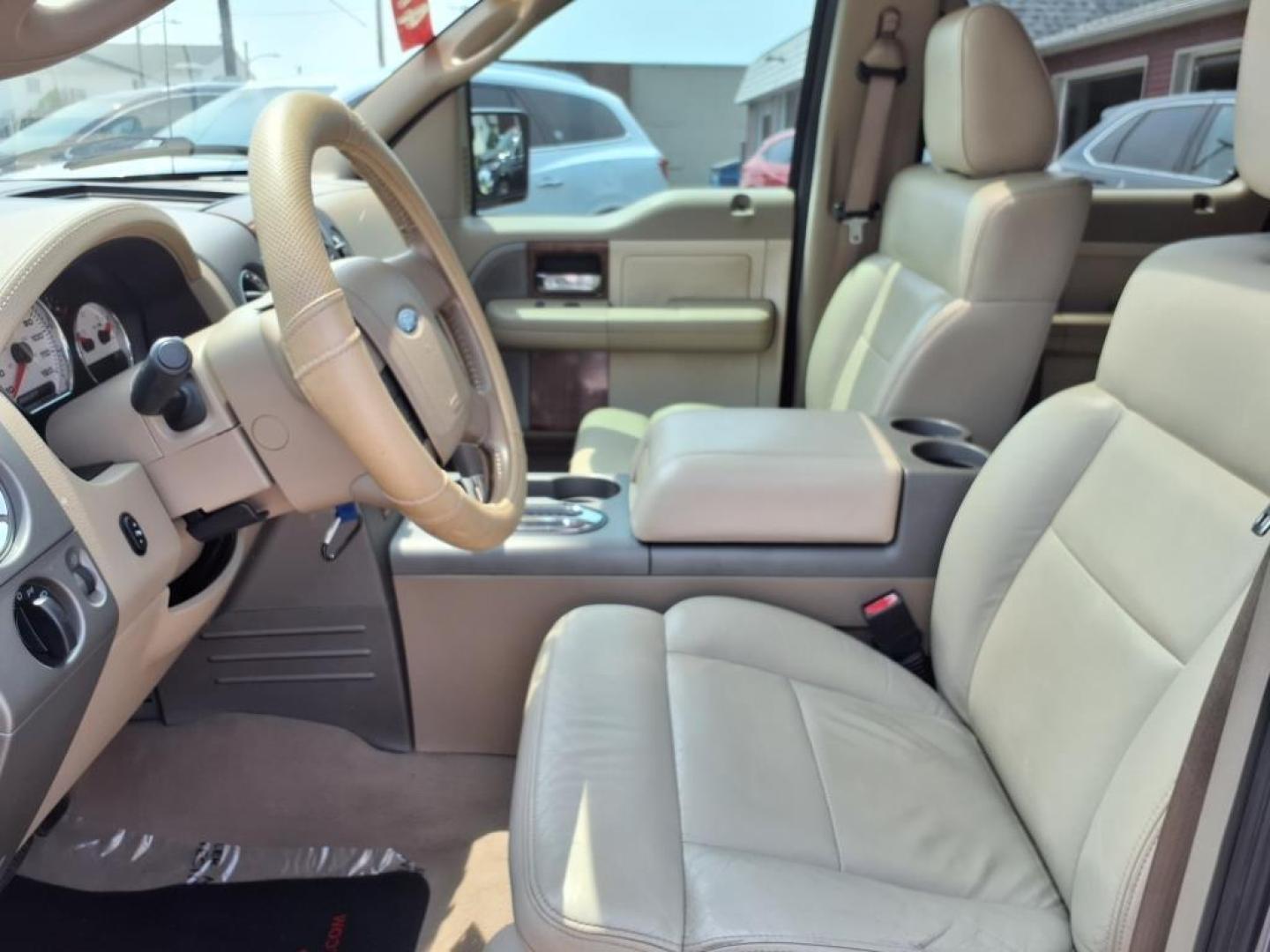 2004 Medium Wedgewood Blue Clearcoat Ford F-150 Lariat (1FTPW14574K) with an 5.4L Triton 5.4L V8 300hp 365ft. lbs. Sequential Multiport Fuel Injection engine, 4-Speed Automatic transmission, located at 5505 N. Summit St., Toledo, OH, 43611, (419) 729-2688, 41.654953, -83.530014 - Photo#2