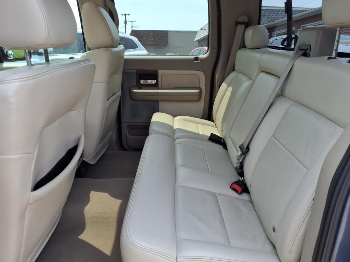 2004 Medium Wedgewood Blue Clearcoat Ford F-150 Lariat (1FTPW14574K) with an 5.4L Triton 5.4L V8 300hp 365ft. lbs. Sequential Multiport Fuel Injection engine, 4-Speed Automatic transmission, located at 5505 N. Summit St., Toledo, OH, 43611, (419) 729-2688, 41.654953, -83.530014 - Photo#4