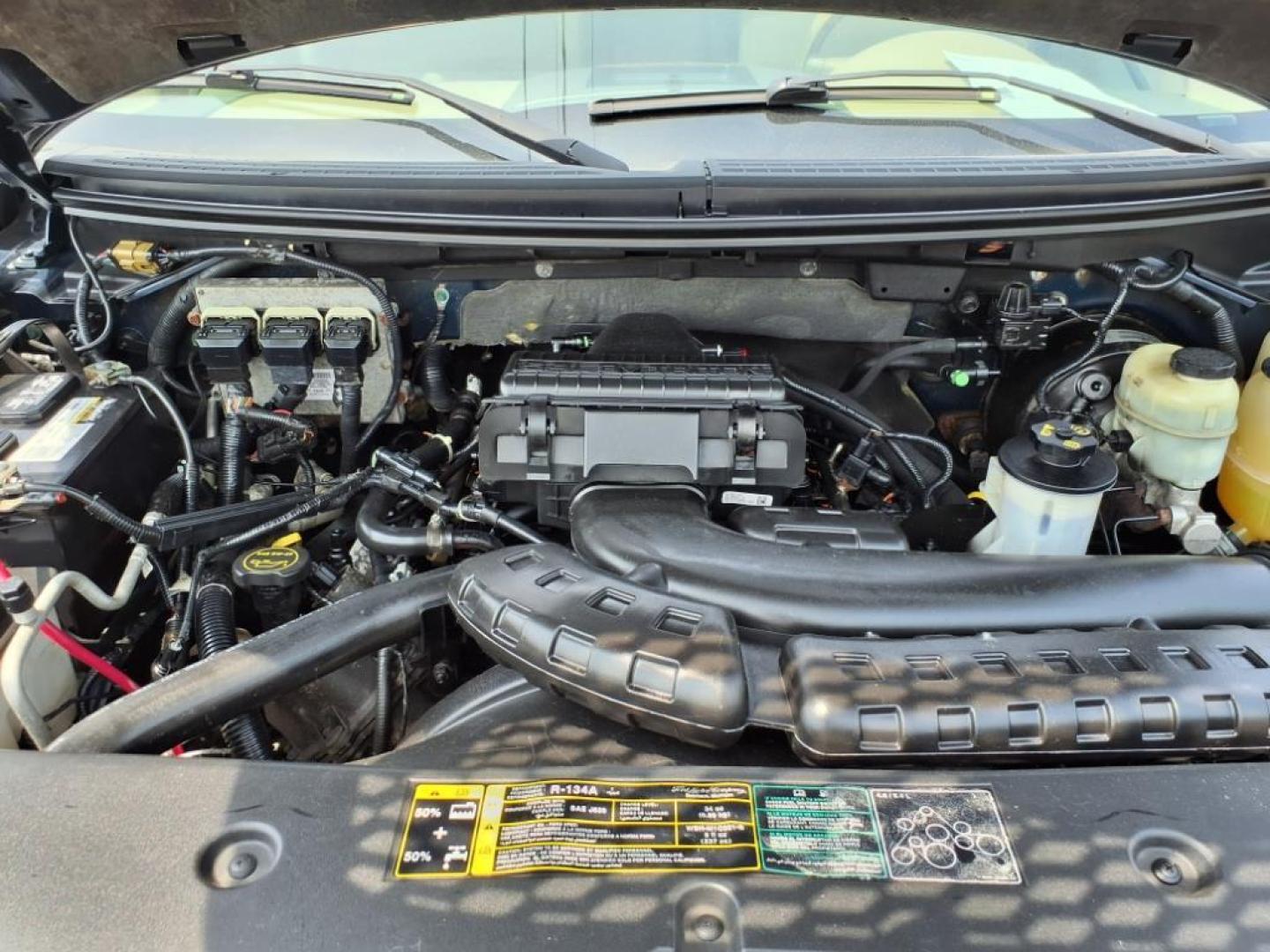2004 Medium Wedgewood Blue Clearcoat Ford F-150 Lariat (1FTPW14574K) with an 5.4L Triton 5.4L V8 300hp 365ft. lbs. Sequential Multiport Fuel Injection engine, 4-Speed Automatic transmission, located at 5505 N. Summit St., Toledo, OH, 43611, (419) 729-2688, 41.654953, -83.530014 - Photo#16