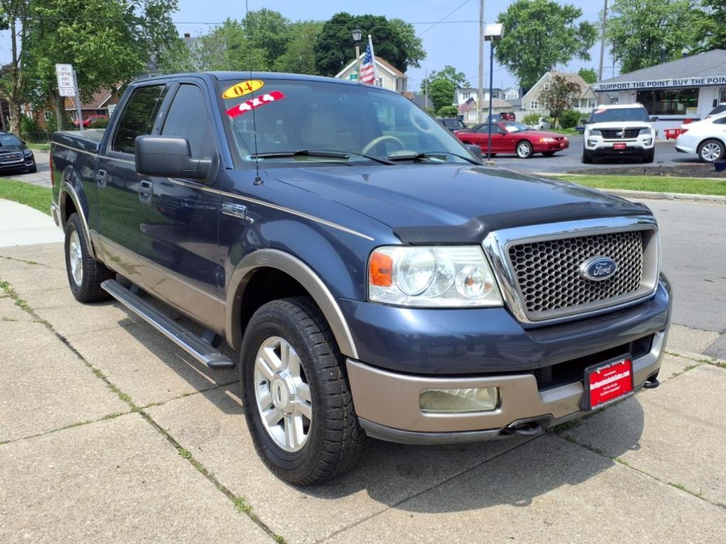 2004 Medium Wedgewood Blue Clearcoat Ford F-150 Lariat (1FTPW14574K) with an 5.4L Triton 5.4L V8 300hp 365ft. lbs. Sequential Multiport Fuel Injection engine, 4-Speed Automatic transmission, located at 5505 N. Summit St., Toledo, OH, 43611, (419) 729-2688, 41.654953, -83.530014 - Photo#17