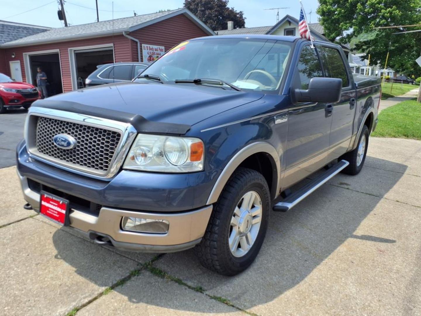 2004 Medium Wedgewood Blue Clearcoat Ford F-150 Lariat (1FTPW14574K) with an 5.4L Triton 5.4L V8 300hp 365ft. lbs. Sequential Multiport Fuel Injection engine, 4-Speed Automatic transmission, located at 5505 N. Summit St., Toledo, OH, 43611, (419) 729-2688, 41.654953, -83.530014 - Photo#19