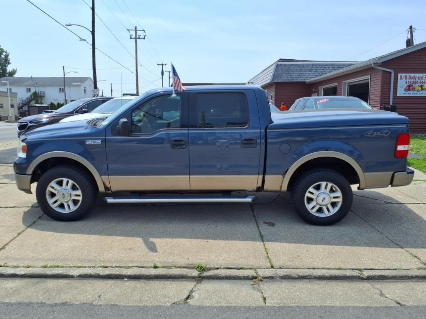 2004 Medium Wedgewood Blue Clearcoat Ford F-150 Lariat (1FTPW14574K) with an 5.4L Triton 5.4L V8 300hp 365ft. lbs. Sequential Multiport Fuel Injection engine, 4-Speed Automatic transmission, located at 5505 N. Summit St., Toledo, OH, 43611, (419) 729-2688, 41.654953, -83.530014 - Photo#20