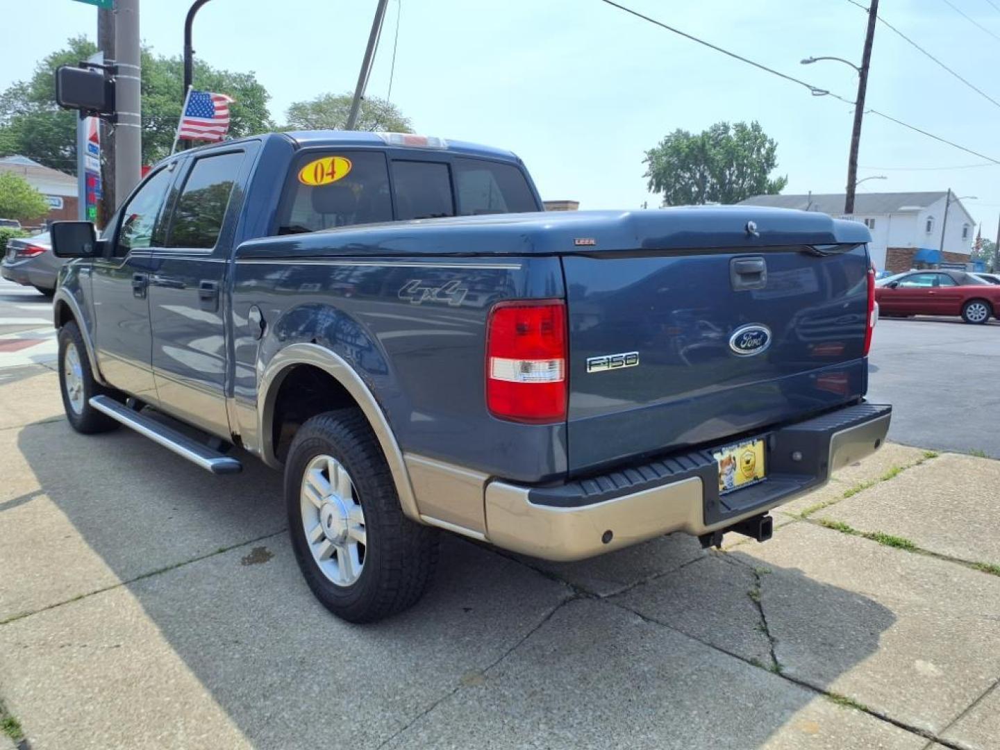 2004 Medium Wedgewood Blue Clearcoat Ford F-150 Lariat (1FTPW14574K) with an 5.4L Triton 5.4L V8 300hp 365ft. lbs. Sequential Multiport Fuel Injection engine, 4-Speed Automatic transmission, located at 5505 N. Summit St., Toledo, OH, 43611, (419) 729-2688, 41.654953, -83.530014 - Photo#21