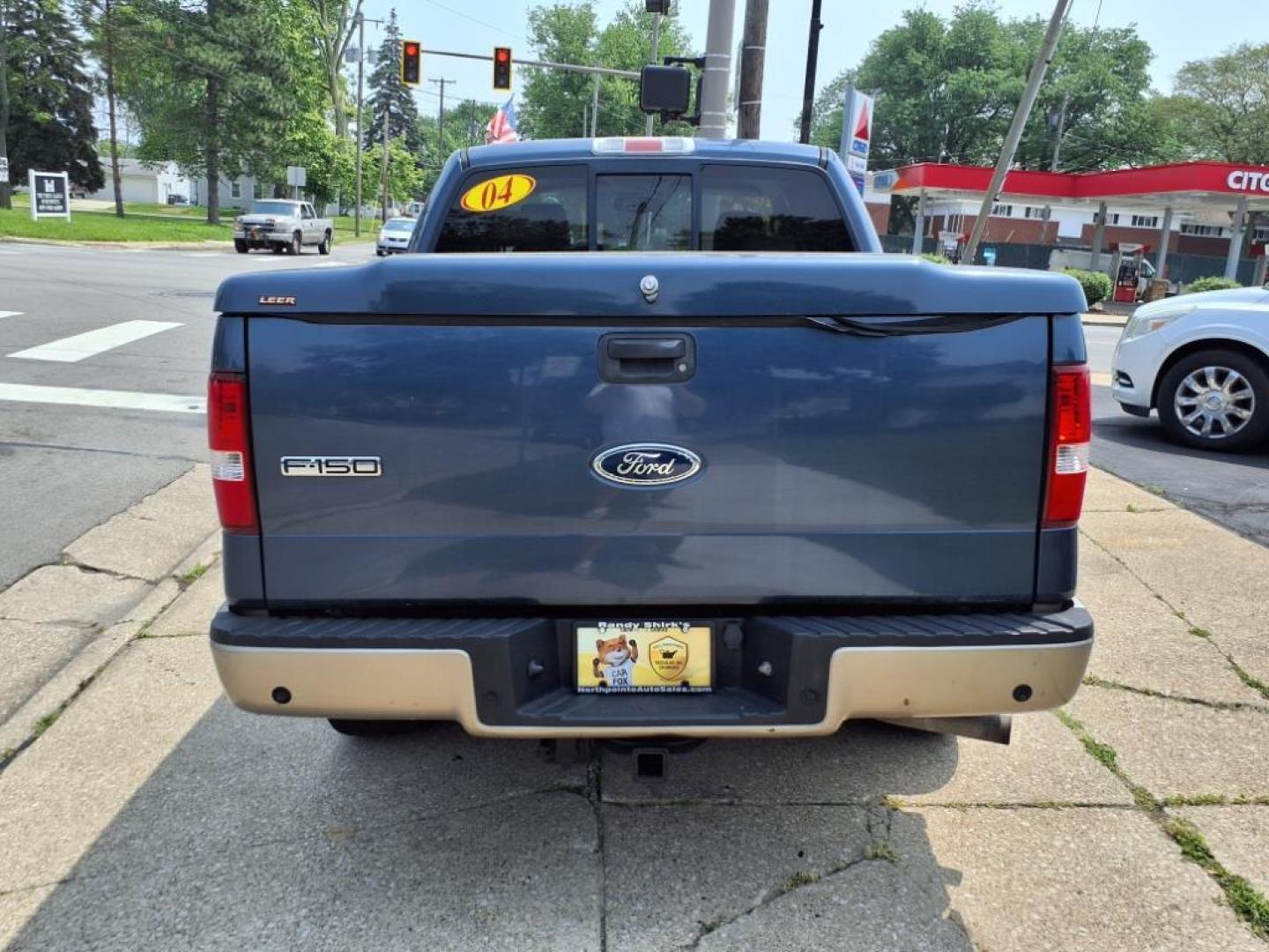 2004 Medium Wedgewood Blue Clearcoat Ford F-150 Lariat (1FTPW14574K) with an 5.4L Triton 5.4L V8 300hp 365ft. lbs. Sequential Multiport Fuel Injection engine, 4-Speed Automatic transmission, located at 5505 N. Summit St., Toledo, OH, 43611, (419) 729-2688, 41.654953, -83.530014 - Photo#22