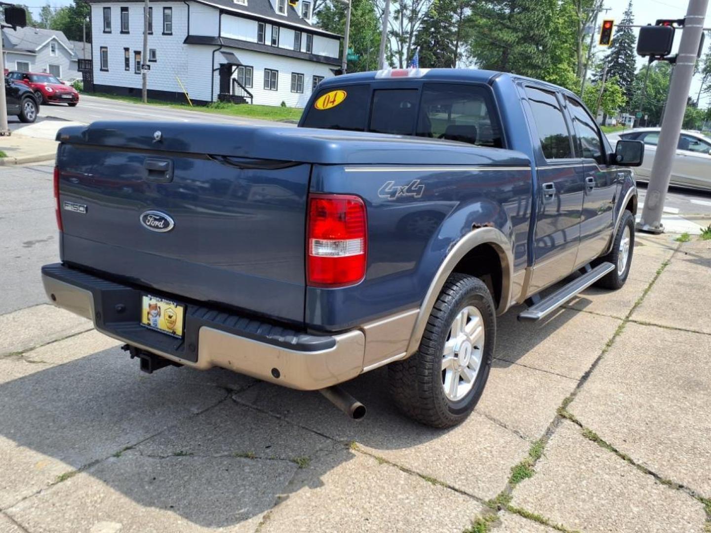 2004 Medium Wedgewood Blue Clearcoat Ford F-150 Lariat (1FTPW14574K) with an 5.4L Triton 5.4L V8 300hp 365ft. lbs. Sequential Multiport Fuel Injection engine, 4-Speed Automatic transmission, located at 5505 N. Summit St., Toledo, OH, 43611, (419) 729-2688, 41.654953, -83.530014 - Photo#23