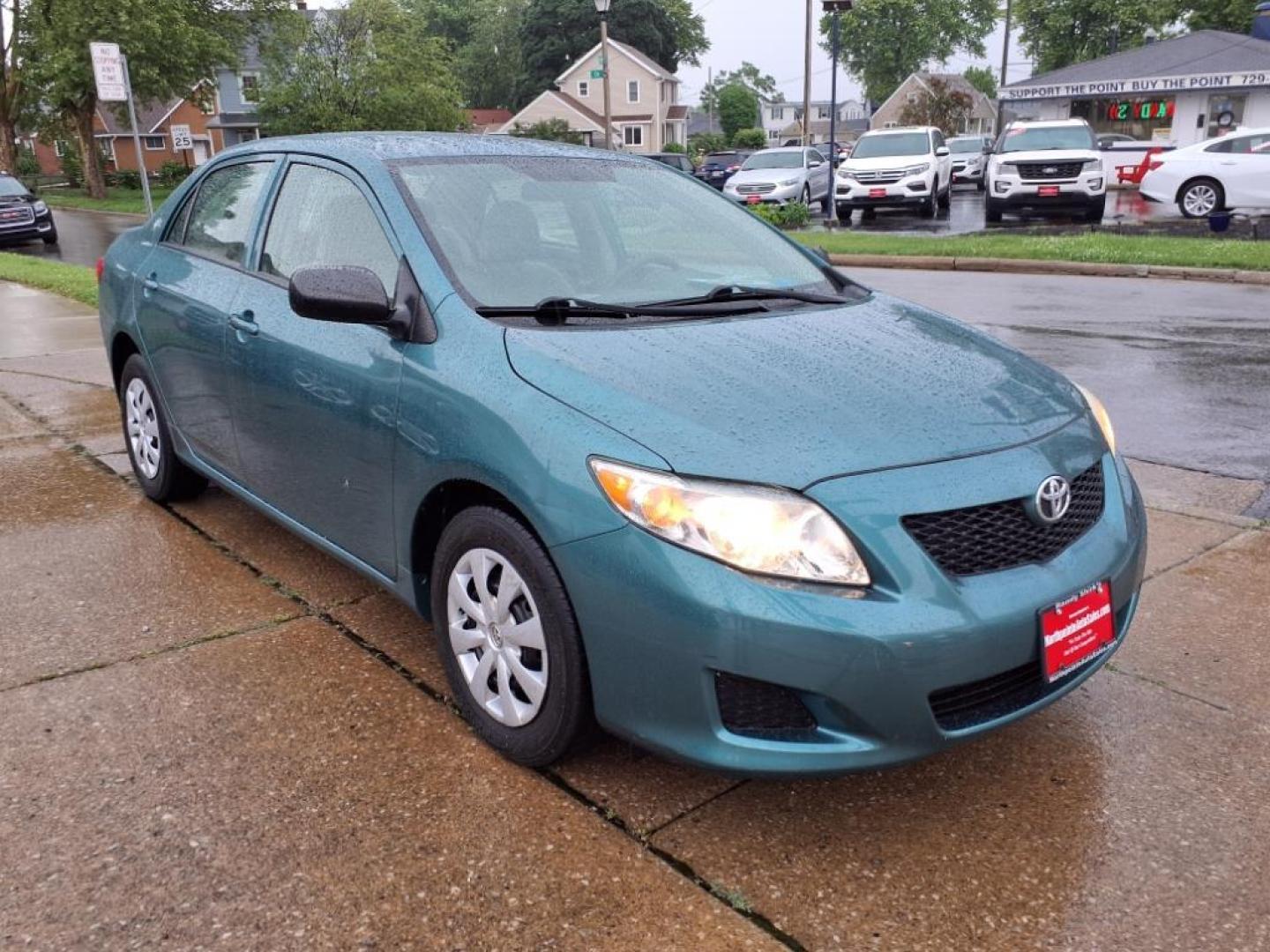 2010 Capri Sea Metallic Toyota Corolla Base (2T1BU4EEXAC) with an 1.8L 1.8L I4 132hp 128ft. lbs. Sequential Multiport Fuel Injection engine, 4-Speed Automatic transmission, located at 5505 N. Summit St., Toledo, OH, 43611, (419) 729-2688, 41.654953, -83.530014 - Photo#11