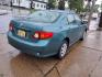 2010 Capri Sea Metallic Toyota Corolla Base (2T1BU4EEXAC) with an 1.8L 1.8L I4 132hp 128ft. lbs. Sequential Multiport Fuel Injection engine, 4-Speed Automatic transmission, located at 5505 N. Summit St., Toledo, OH, 43611, (419) 729-2688, 41.654953, -83.530014 - Photo#17