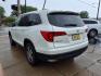 2018 White Diamond Pearl Honda Pilot EX-L w/RES (5FNYF6H89JB) with an 3.5L 3.5L V6 280hp 262ft. lbs. Direct Injection engine, 6-Speed Shiftable Automatic transmission, located at 5505 N. Summit St., Toledo, OH, 43611, (419) 729-2688, 41.654953, -83.530014 - Photo#24