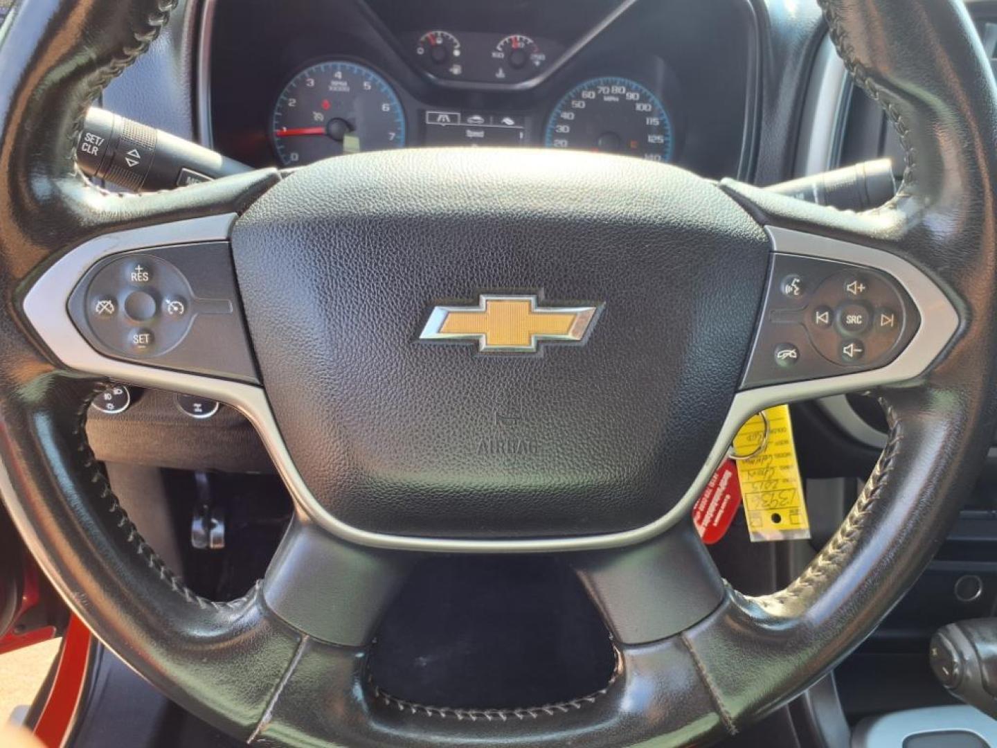 2015 Red Hot Chevrolet Colorado LT (1GCHTBEAXF1) with an 2.5L 2.5L I4 200hp 191ft. lbs. Direct Injection engine, 6-Speed Shiftable Automatic transmission, located at 5505 N. Summit St., Toledo, OH, 43611, (419) 729-2688, 41.654953, -83.530014 - Photo#7