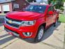2015 Red Hot Chevrolet Colorado LT (1GCHTBEAXF1) with an 2.5L 2.5L I4 200hp 191ft. lbs. Direct Injection engine, 6-Speed Shiftable Automatic transmission, located at 5505 N. Summit St., Toledo, OH, 43611, (419) 729-2688, 41.654953, -83.530014 - Photo#17
