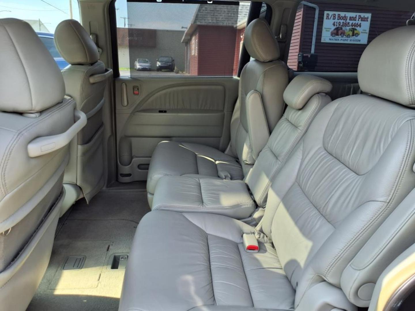 2006 Sage Brush Pearl Honda Odyssey EX-L (5FNRL38666B) with an 3.5L 3L NA V6 single overhead cam (SOHC) 24V Fuel Injected engine, 5-Speed Automatic transmission, located at 5505 N. Summit St., Toledo, OH, 43611, (419) 729-2688, 41.654953, -83.530014 - Photo#4