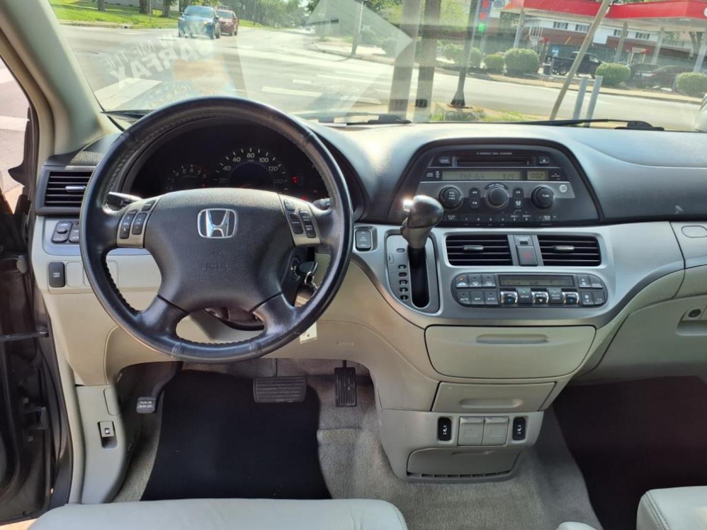 2006 Sage Brush Pearl Honda Odyssey EX-L (5FNRL38666B) with an 3.5L 3L NA V6 single overhead cam (SOHC) 24V Fuel Injected engine, 5-Speed Automatic transmission, located at 5505 N. Summit St., Toledo, OH, 43611, (419) 729-2688, 41.654953, -83.530014 - Photo#6