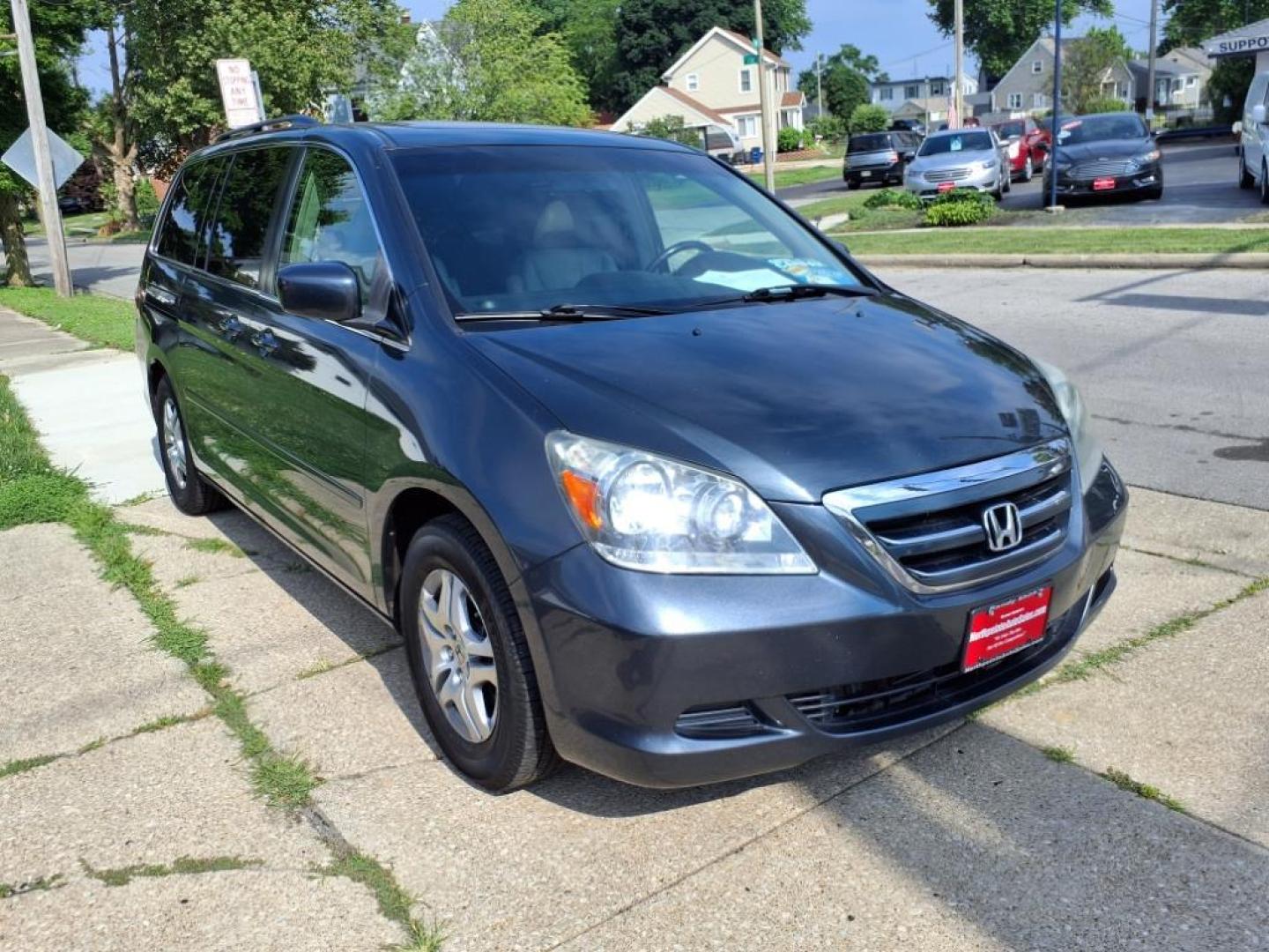 2006 Sage Brush Pearl Honda Odyssey EX-L (5FNRL38666B) with an 3.5L 3L NA V6 single overhead cam (SOHC) 24V Fuel Injected engine, 5-Speed Automatic transmission, located at 5505 N. Summit St., Toledo, OH, 43611, (419) 729-2688, 41.654953, -83.530014 - Photo#18