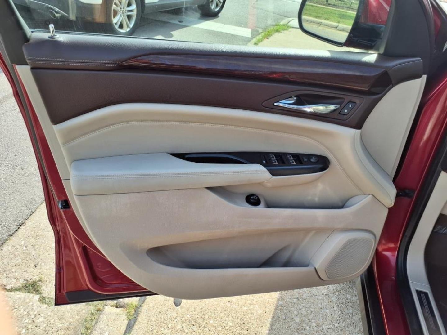2014 Crystal Red Tintcoat Cadillac SRX Performance Collection (3GYFNCE36ES) with an 3.6L 3.6L V6 308hp 265ft. lbs. Direct Injection engine, 6-Speed Shiftable Automatic transmission, located at 5505 N. Summit St., Toledo, OH, 43611, (419) 729-2688, 41.654953, -83.530014 - Photo#6