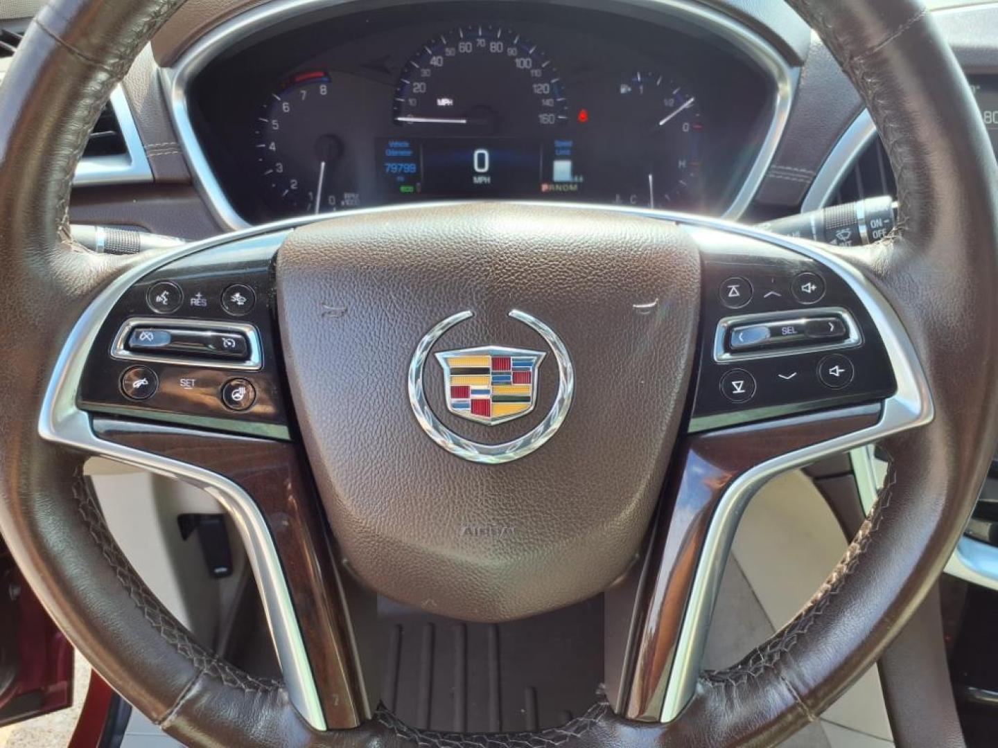 2014 Crystal Red Tintcoat Cadillac SRX Performance Collection (3GYFNCE36ES) with an 3.6L 3.6L V6 308hp 265ft. lbs. Direct Injection engine, 6-Speed Shiftable Automatic transmission, located at 5505 N. Summit St., Toledo, OH, 43611, (419) 729-2688, 41.654953, -83.530014 - Photo#8