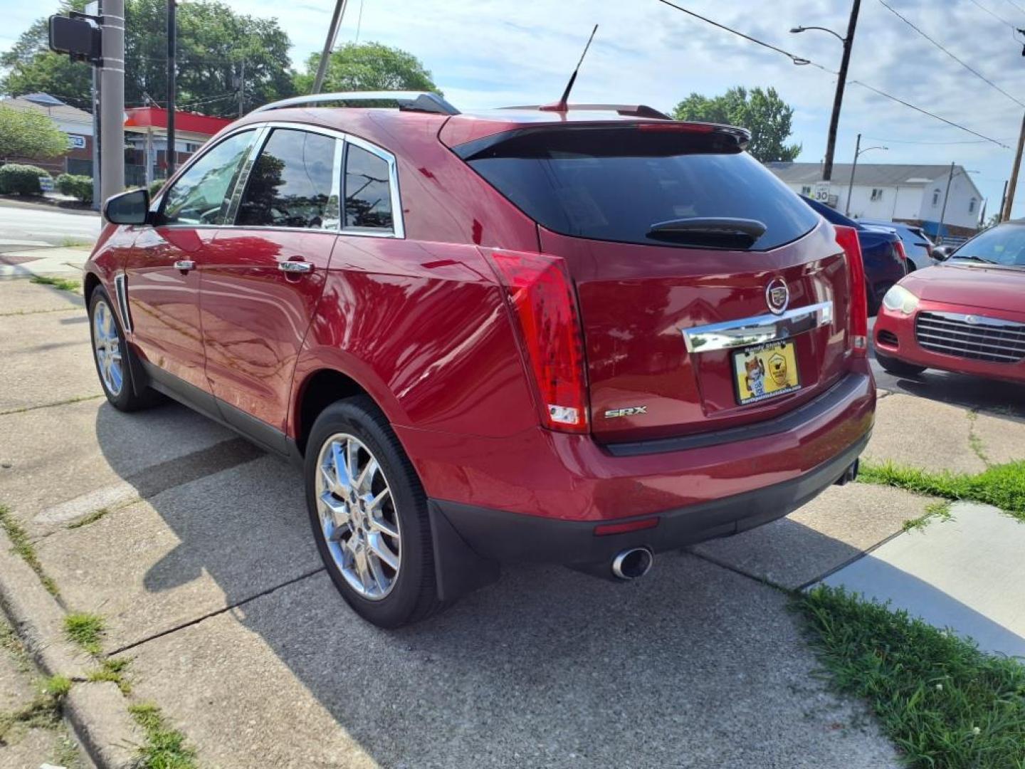 2014 Crystal Red Tintcoat Cadillac SRX Performance Collection (3GYFNCE36ES) with an 3.6L 3.6L V6 308hp 265ft. lbs. Direct Injection engine, 6-Speed Shiftable Automatic transmission, located at 5505 N. Summit St., Toledo, OH, 43611, (419) 729-2688, 41.654953, -83.530014 - Photo#24