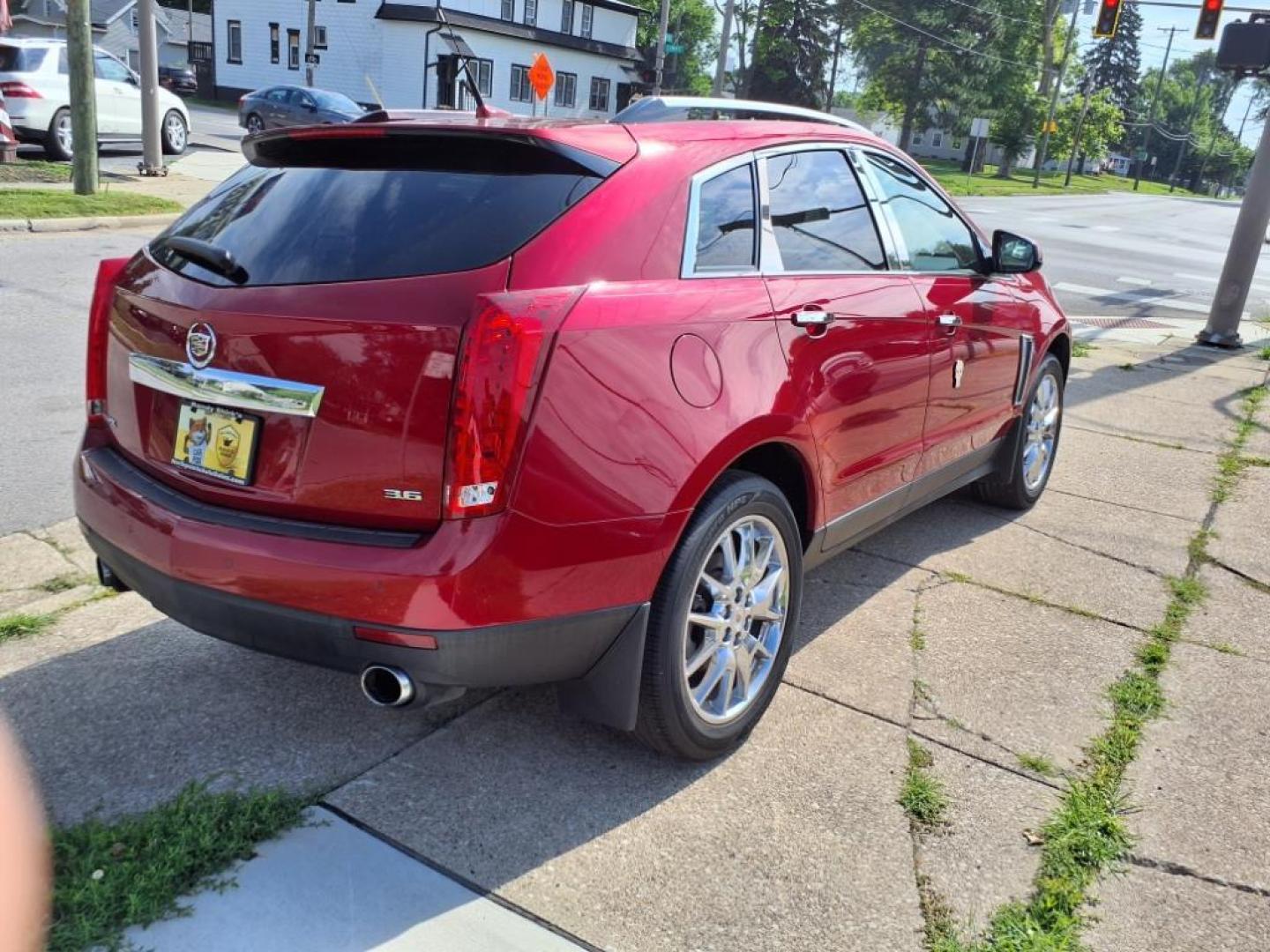 2014 Crystal Red Tintcoat Cadillac SRX Performance Collection (3GYFNCE36ES) with an 3.6L 3.6L V6 308hp 265ft. lbs. Direct Injection engine, 6-Speed Shiftable Automatic transmission, located at 5505 N. Summit St., Toledo, OH, 43611, (419) 729-2688, 41.654953, -83.530014 - Photo#26