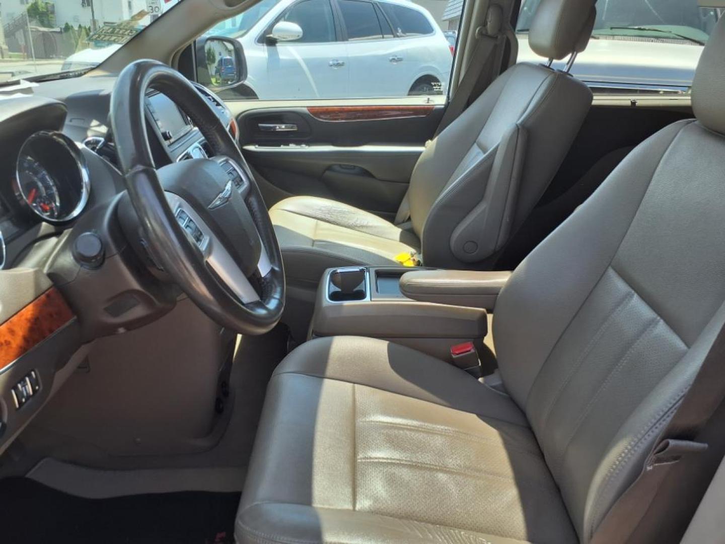 2016 Bright White Clear Coat Chrysler Town and Country Touring-L (2C4RC1CG3GR) with an 3.6L Pentastar 3.6L Flex Fuel V6 283hp 260ft. lbs. Sequential Multiport Fuel Injection engine, 6-Speed Shiftable Automatic transmission, located at 5505 N. Summit St., Toledo, OH, 43611, (419) 729-2688, 41.654953, -83.530014 - Photo#2