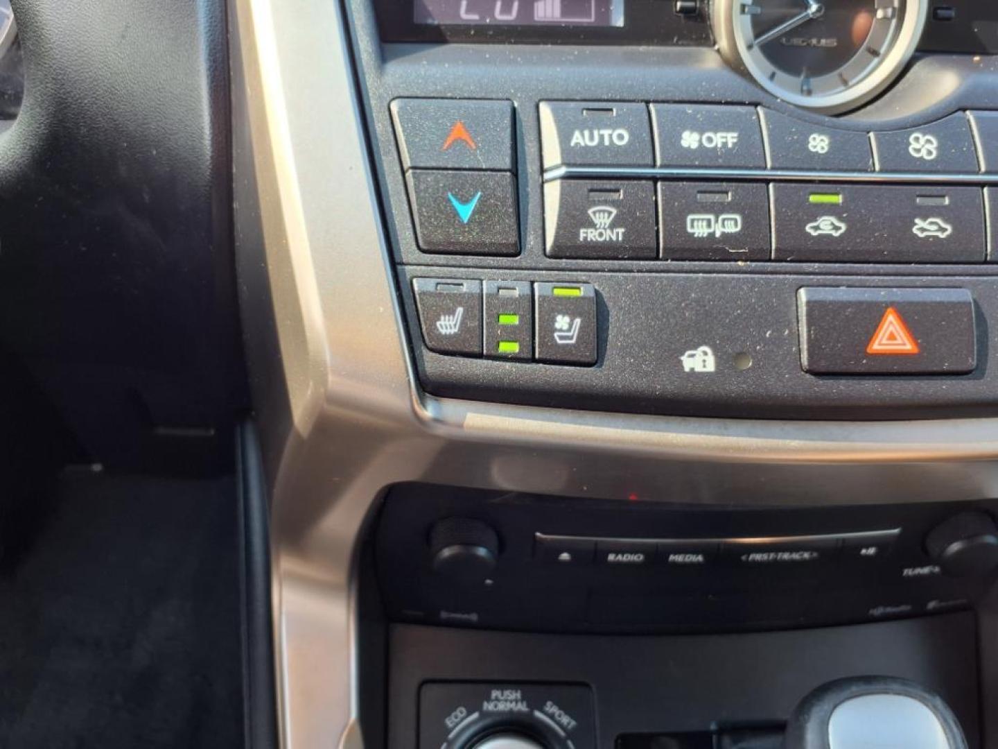 2015 Obsidian Lexus NX 200t Base (JTJBARBZXF2) with an 2.0L 2.0L Turbo I4 235hp 258ft. lbs. Direct Injection engine, 6-Speed Shiftable Automatic transmission, located at 5505 N. Summit St., Toledo, OH, 43611, (419) 729-2688, 41.654953, -83.530014 - Photo#11