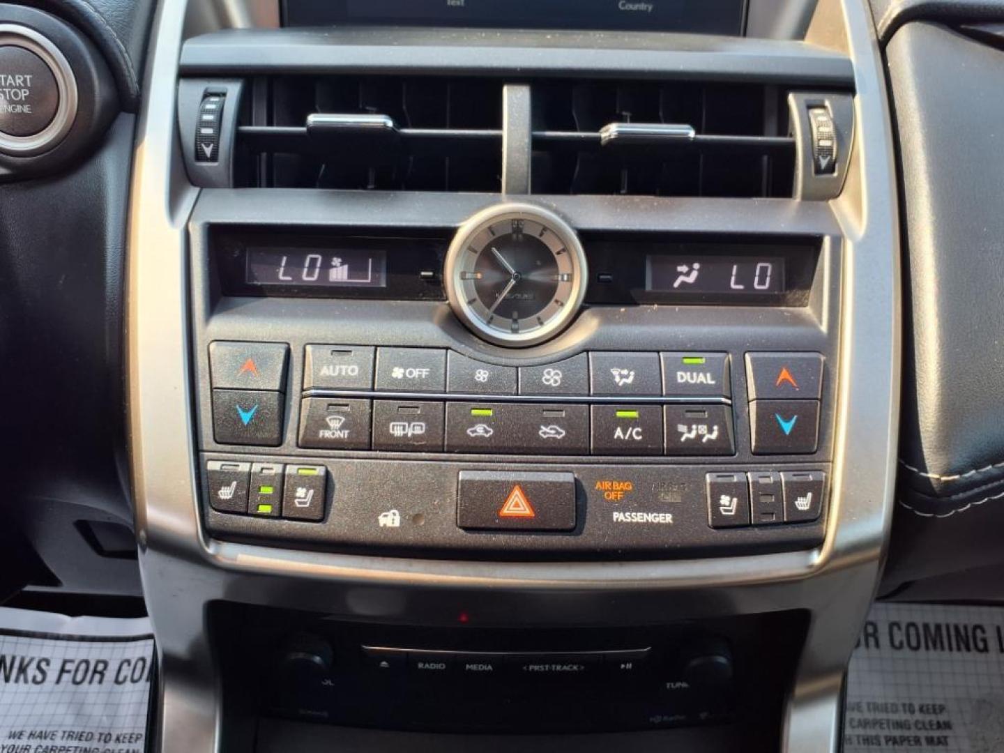 2015 Obsidian Lexus NX 200t Base (JTJBARBZXF2) with an 2.0L 2.0L Turbo I4 235hp 258ft. lbs. Direct Injection engine, 6-Speed Shiftable Automatic transmission, located at 5505 N. Summit St., Toledo, OH, 43611, (419) 729-2688, 41.654953, -83.530014 - Photo#13