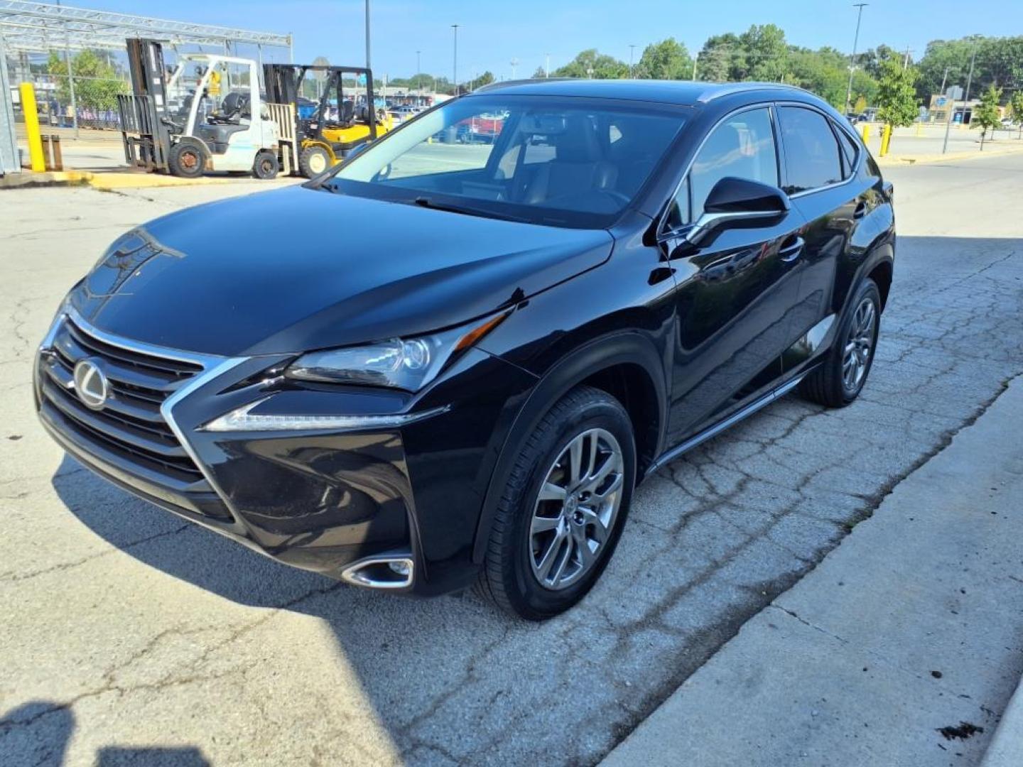 2015 Obsidian Lexus NX 200t Base (JTJBARBZXF2) with an 2.0L 2.0L Turbo I4 235hp 258ft. lbs. Direct Injection engine, 6-Speed Shiftable Automatic transmission, located at 5505 N. Summit St., Toledo, OH, 43611, (419) 729-2688, 41.654953, -83.530014 - Photo#22