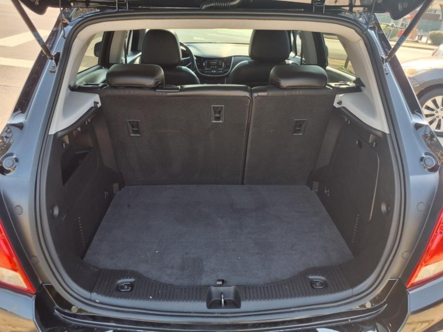 2018 Mosaic Black Metallic Chevrolet Trax LT (3GNCJLSBXJL) with an 1.4L Ecotec 1.4L Turbo I4 138hp 148ft. lbs. Sequential Multiport Fuel Injection engine, 6-Speed Shiftable Automatic transmission, located at 5505 N. Summit St., Toledo, OH, 43611, (419) 729-2688, 41.654953, -83.530014 - Photo#19