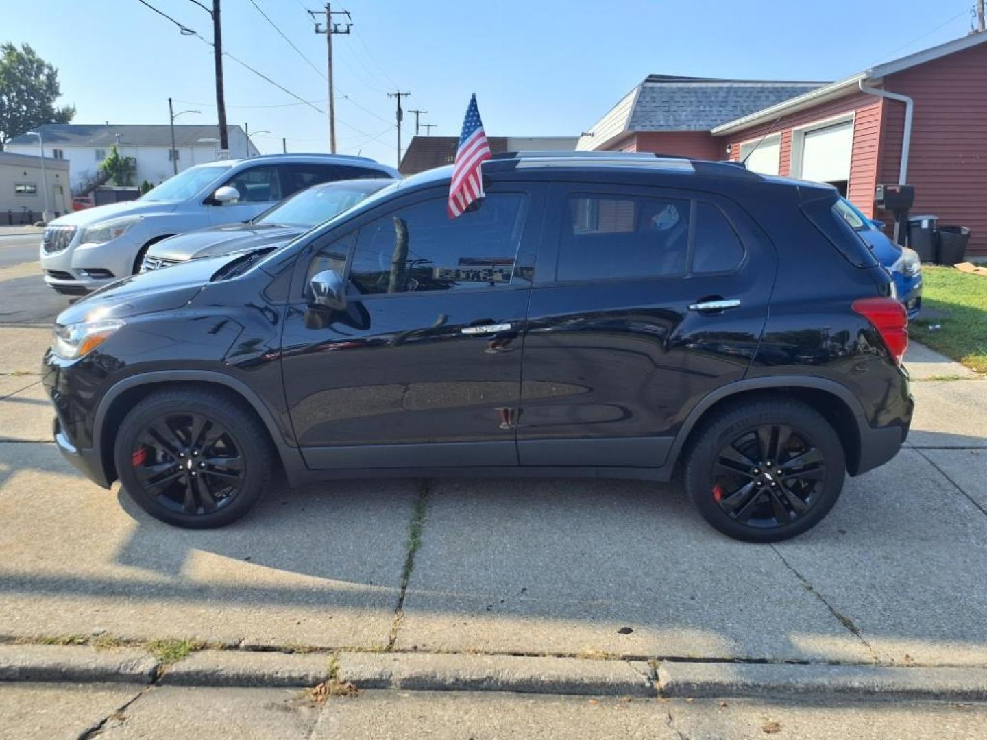 2018 Mosaic Black Metallic Chevrolet Trax LT (3GNCJLSBXJL) with an 1.4L Ecotec 1.4L Turbo I4 138hp 148ft. lbs. Sequential Multiport Fuel Injection engine, 6-Speed Shiftable Automatic transmission, located at 5505 N. Summit St., Toledo, OH, 43611, (419) 729-2688, 41.654953, -83.530014 - Photo#22