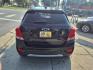 2018 Mosaic Black Metallic Chevrolet Trax LT (3GNCJLSBXJL) with an 1.4L Ecotec 1.4L Turbo I4 138hp 148ft. lbs. Sequential Multiport Fuel Injection engine, 6-Speed Shiftable Automatic transmission, located at 5505 N. Summit St., Toledo, OH, 43611, (419) 729-2688, 41.654953, -83.530014 - Photo#24