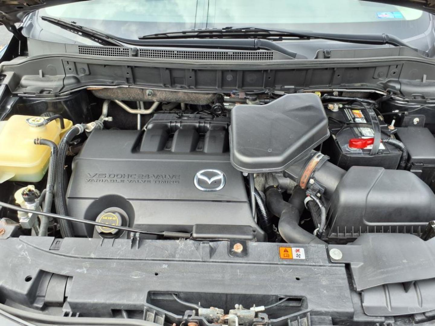 2014 Jet Black Mica Mazda CX-9 Grand Touring (JM3TB3DA1E0) with an 3.7L 3.7L V6 273hp 270ft. lbs. Fuel Injected engine, 6-Speed Shiftable Automatic transmission, located at 5505 N. Summit St., Toledo, OH, 43611, (419) 729-2688, 41.654953, -83.530014 - Photo#20