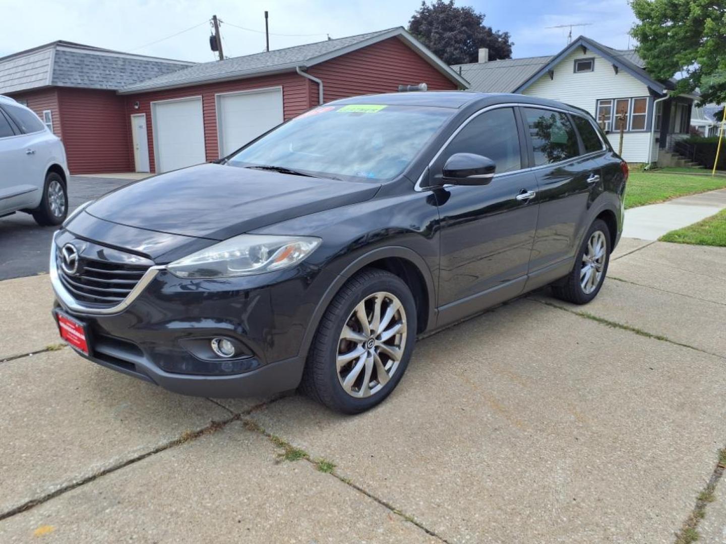 2014 Jet Black Mica Mazda CX-9 Grand Touring (JM3TB3DA1E0) with an 3.7L 3.7L V6 273hp 270ft. lbs. Fuel Injected engine, 6-Speed Shiftable Automatic transmission, located at 5505 N. Summit St., Toledo, OH, 43611, (419) 729-2688, 41.654953, -83.530014 - Photo#23
